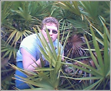 Tahiri, the IRL Tahiri, hiding behind some bushes.
