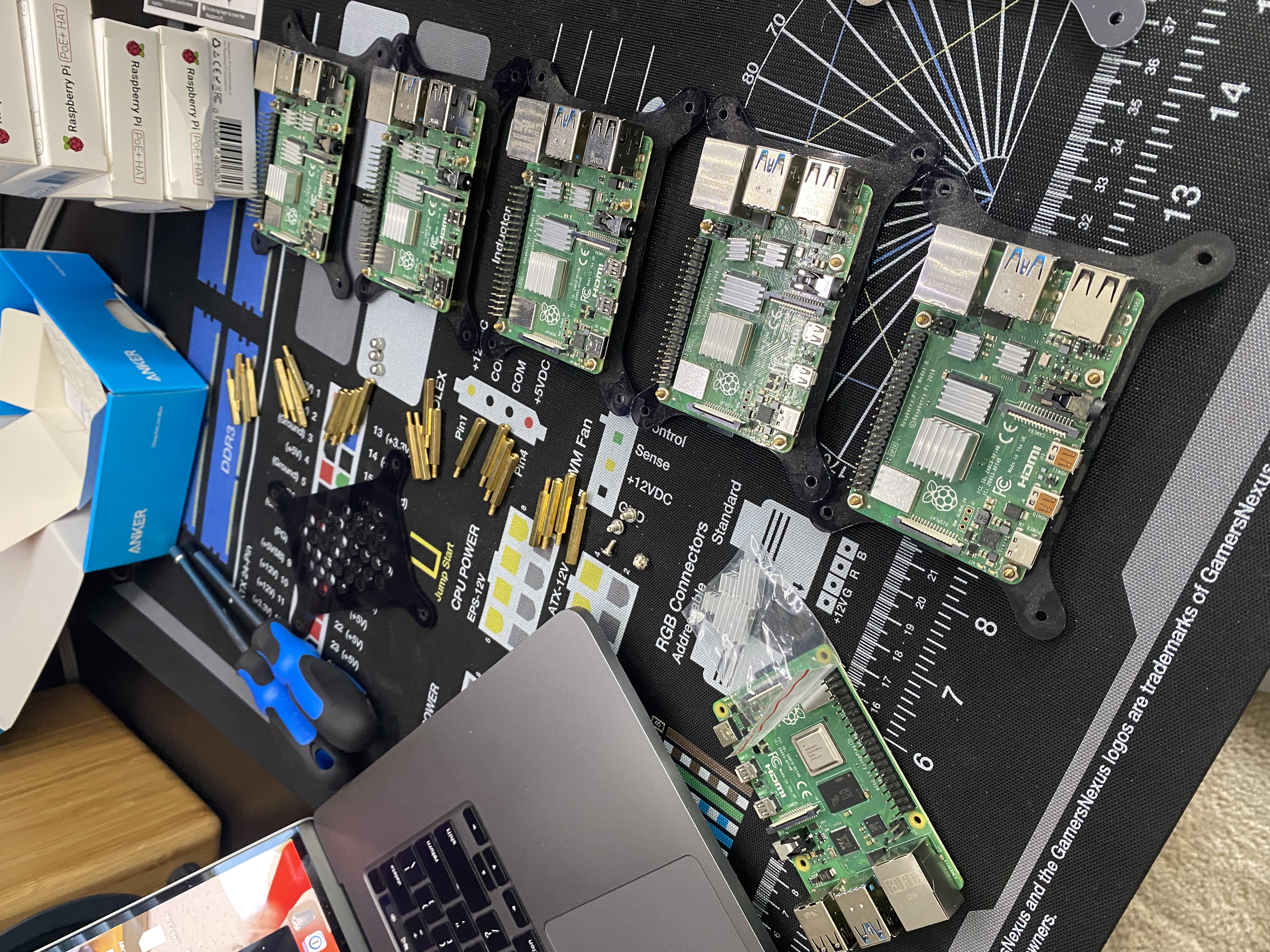 Six Raspberry Pi boards, all on the desk.