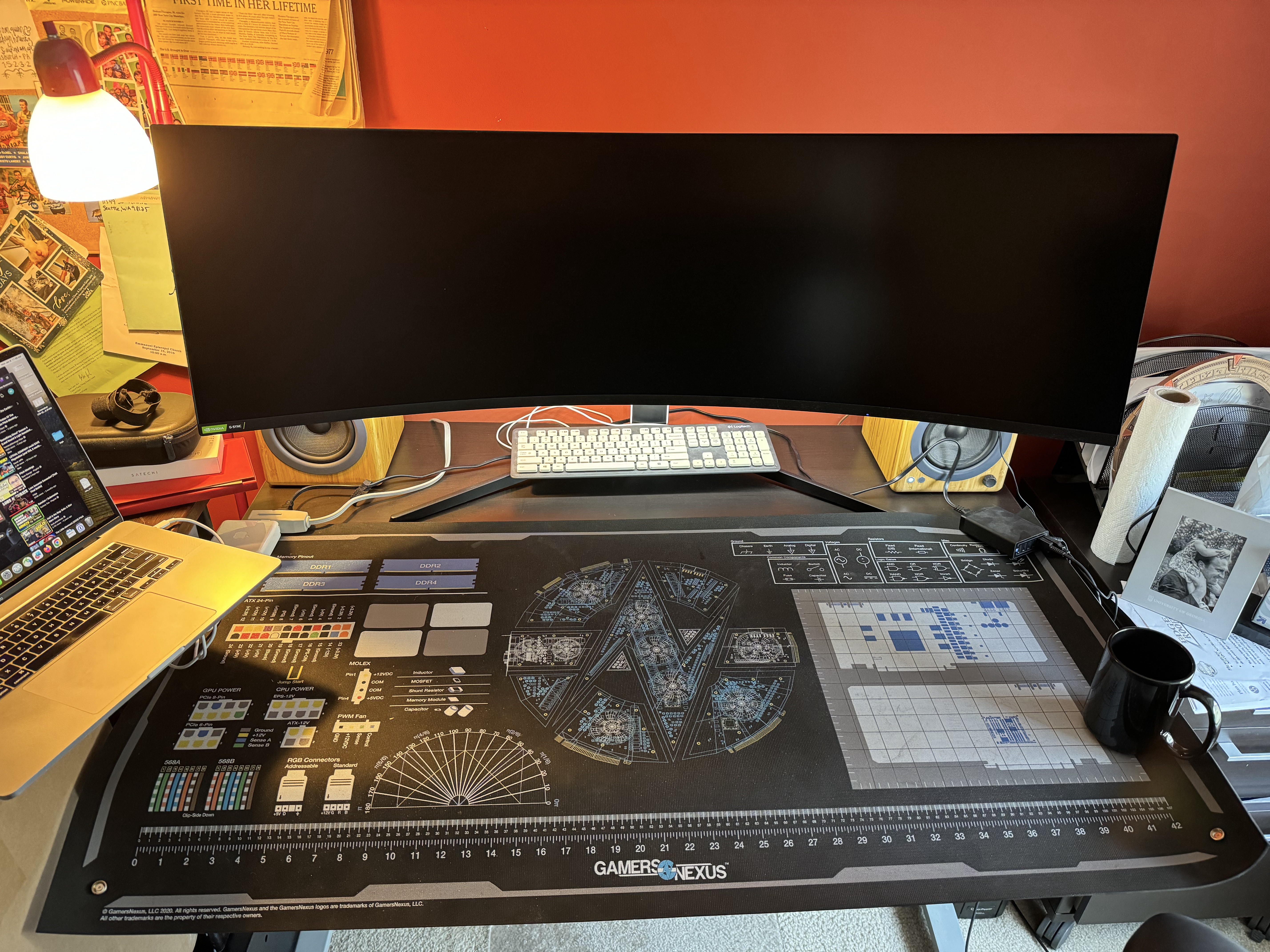 A clear desk space with a Gamers Nexus antistatic mat.