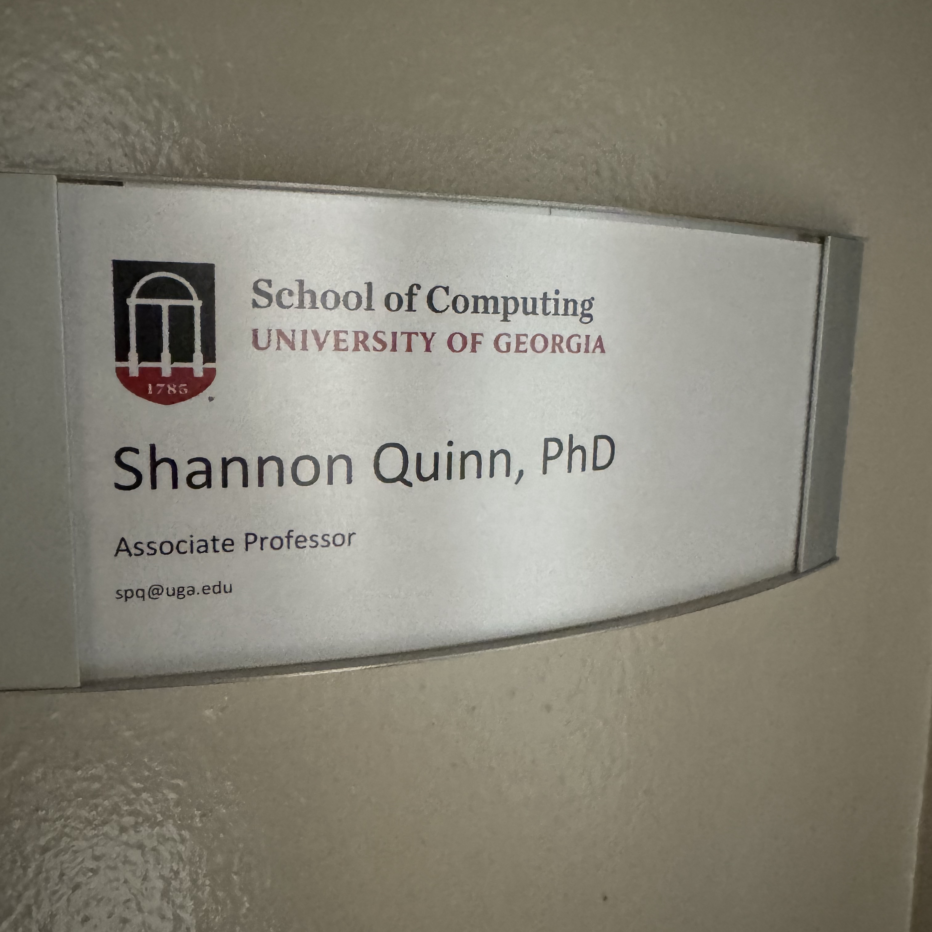 My UGA nameplate, which hung outside my Boyd office. It says School of Computing, University of Georgia. Shannon Quinn, PhD. Associate Professor.